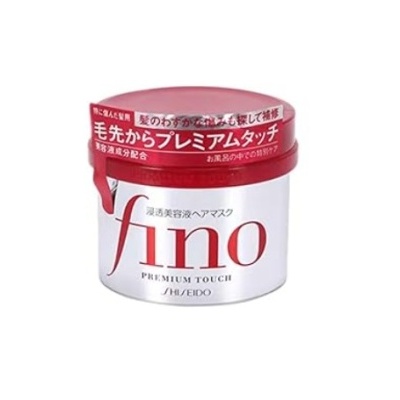 Embalagem branca e vermelha de produto cosmético fino Premium Touch da Shiseido