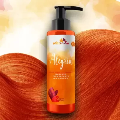 Frasco laranja de máscara pigmentante para cabelo ruivo com doseador preto e rótulo branco e laranja.