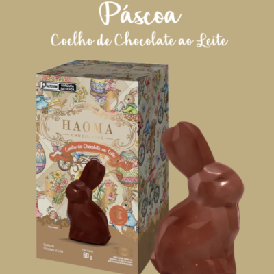 Coelho de chocolate ao leite com embalagem decorativa de Páscoa com ilustrações de coelhos e ovos