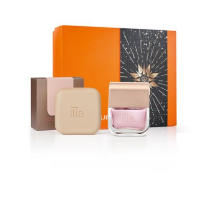 Conjunto de cosméticos Ilia com frasco de vidro, embalagem bege e caixa laranja decorada