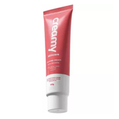 tubo de creme para cuidados da pele creamy rosa e branco com texto e tampa branca