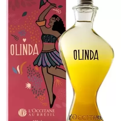 Perfume OLINDA da L'OCCITANE AU BRÉSIL com caixa rosa e ilustração de mulher dançando