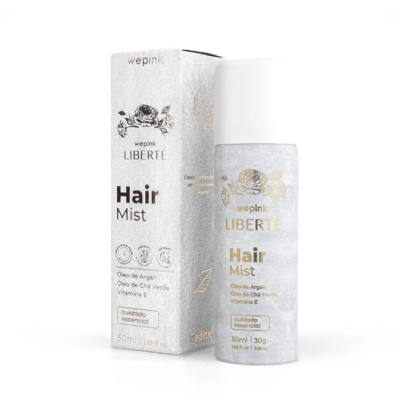 Frasco de Hair Mist Wepink LIBERTÉ branco com embalagem branca ao lado, detalhes em dourado e preto