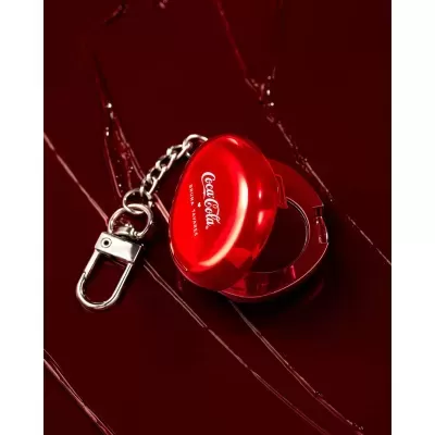 Chaveiro vermelho com abridor de garrafas Coca-Cola