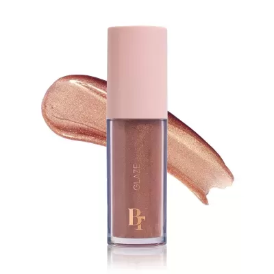 Brilho labial ou verniz com glitter dourado em frasco transparente e tampa rosa