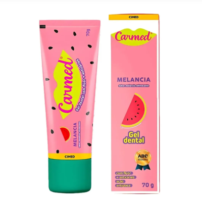Gel dental sabor melancia Carmed em tubo rosa e verde com embalagem rosa
