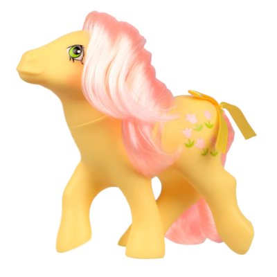 Boneco de cavalo amarelo com crina rosa e estampa de flores