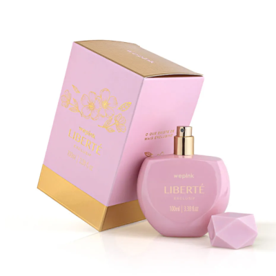 Frasco de perfume rosa claro com caixa cor-de-rosa e detalhes dourados