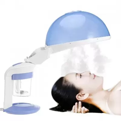 Máquina de sauna facial a vapor com cúpula azul e base branca num fundo branco
