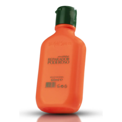 Garrafa laranja com tampa verde com texto REPARADOR PODEROSO