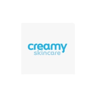 Logótipo 'creamy skincare' em azul sobre fundo branco