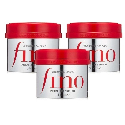 Três embalagens do Fino Premium Touch Shiseido com tampas vermelhas e corpos prateados.