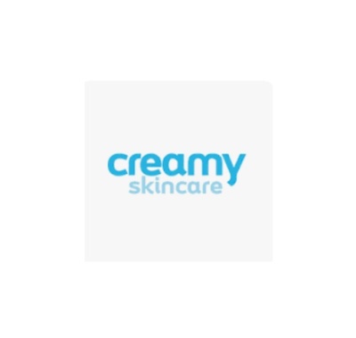 Logótipo 'creamy skincare' em azul sobre fundo branco