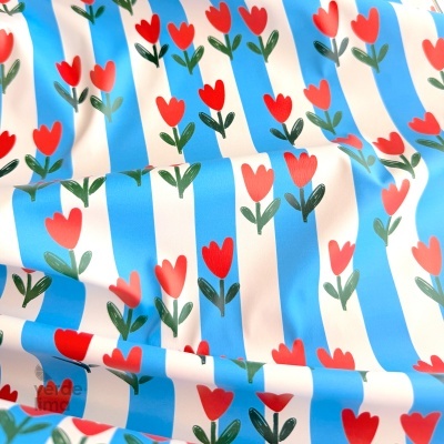 Tecido raincoat - Riscas azuis e tulipas