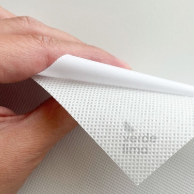 Entretela TNT autocolante