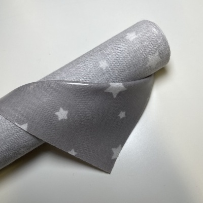 Retalho 28x75cm - Estrelas fundo cinzento (plastificado)