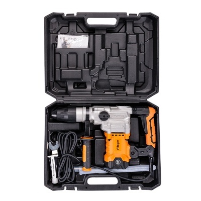 Conjunto de ferramenta elétrica em caixa preta com martelo perfurador laranja e preta e acessórios