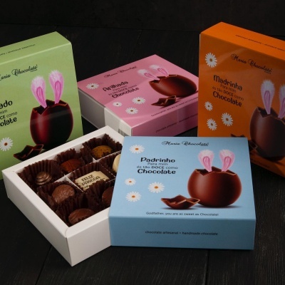 caixas coloridas de bombons de chocolate artesanais com tema de coelho