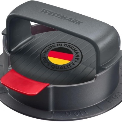 Dispositivo de cozinha preto e vermelho com alça e etiqueta MADE IN GERMANY