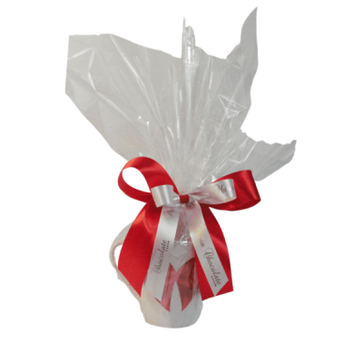 Embalagem translúcida com laço vermelho e branco, texto Mia Cioccolata.