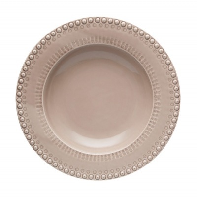 Prato cerâmico bege com padrão circular em relevo na borda