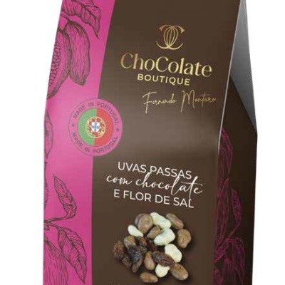 Embalagem de chocolate com uvas passas e flor de sal, design castanho e rosa