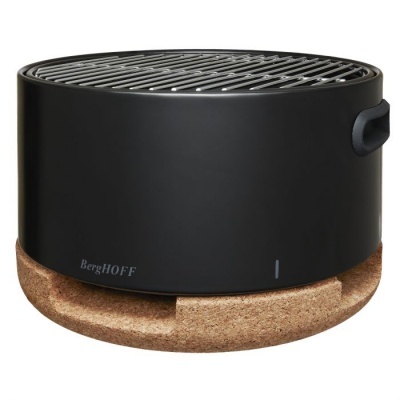 Churrasqueira portátil preta com base de cortiça e grelha prateada no topo