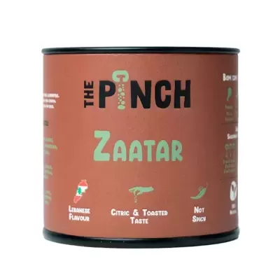 Embalagem cilíndrica de tempero ZAATAR da THE PINCH laranja