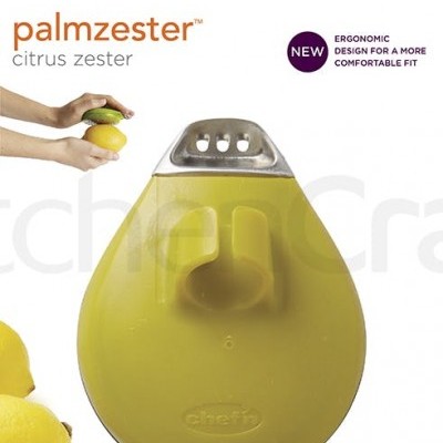 Ralador de citrinos amarelo com parte metálica em embalagem