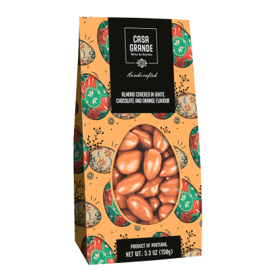 Embalagem de amêndoas cobertas com chocolate branco e sabor a laranja da CASA GRANDE