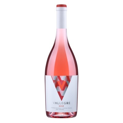 Garrafa de vinho rosé Vallegré com rótulo branco e padrões vermelhos.