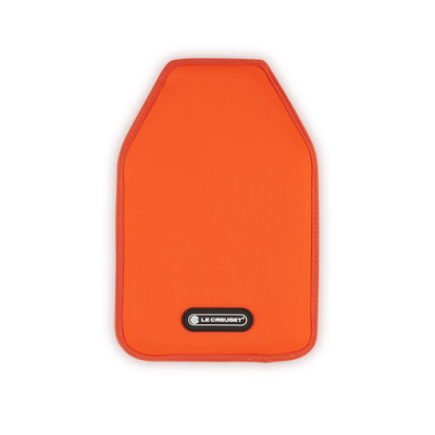 Protectores de canto de mesa laranja com bordas vermelhas e etiqueta LE CREUSET