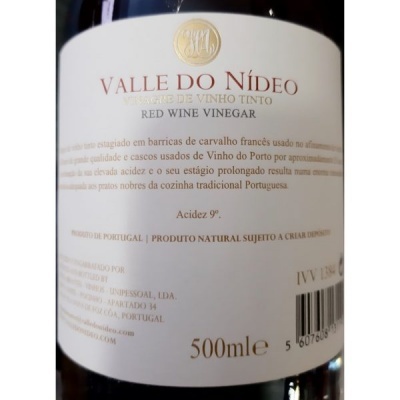 Garrafa de vinagre de vinho tinto Valle do Nideu com rótulo branco e texto vermelho e preto