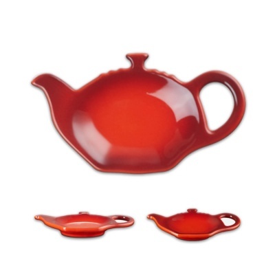 Conjunto de descansos de chá em cerâmica vermelha com formato de bule