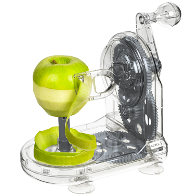 Descascador de maçãs transparente com maçã verde a ser descascada
