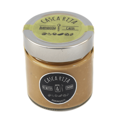 Frasco amarelo de vidro com tampa preta e rótulos da marca CASCARIJA