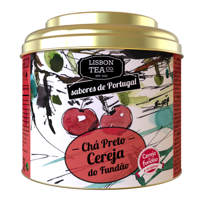 Lata dourada de chá preto de cereja com design ilustrado e texto em português