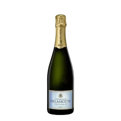Garrafa de champanhe Delamotte com rótulo branco e cápsula dourada