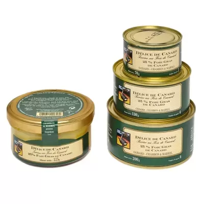 Quatro latas metálicas de Paté de Foie Gras de Canard com rótulos verdes e dourados