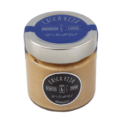 Frasco amarelo com tampa azul e etiqueta preta com texto