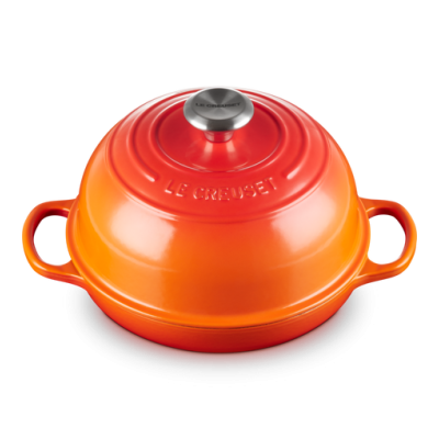 Panela Le Creuset laranja esmaltada com tampa redonda e alças laterais