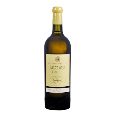 Garrafa de vinho branco com rótulo creme e rolha amarela