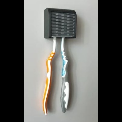 Suporte de escovas de dentes com duas escovas montado na parede