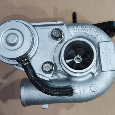 Turbo metálico prateado com componentes e números gravados