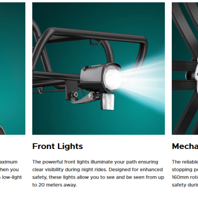 Luz traseira, luz dianteira acesa e travão de disco mecânico numa bicicleta