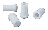 Quatro protetores brancos tubulares de plástico com extremidade fechada