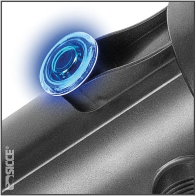 Peça plástica cinza com componente azul e texto SICCE