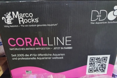 Embalagem preta do produto CORALLINE da Marco Rocks com textos e código QR