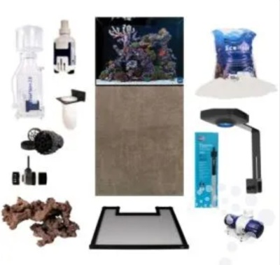 Kit completo para aquário marinho com areia branca, pedras, iluminação e acessórios.