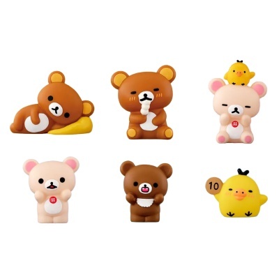 Figuras de brinquedo de ursos e patos coloridos.